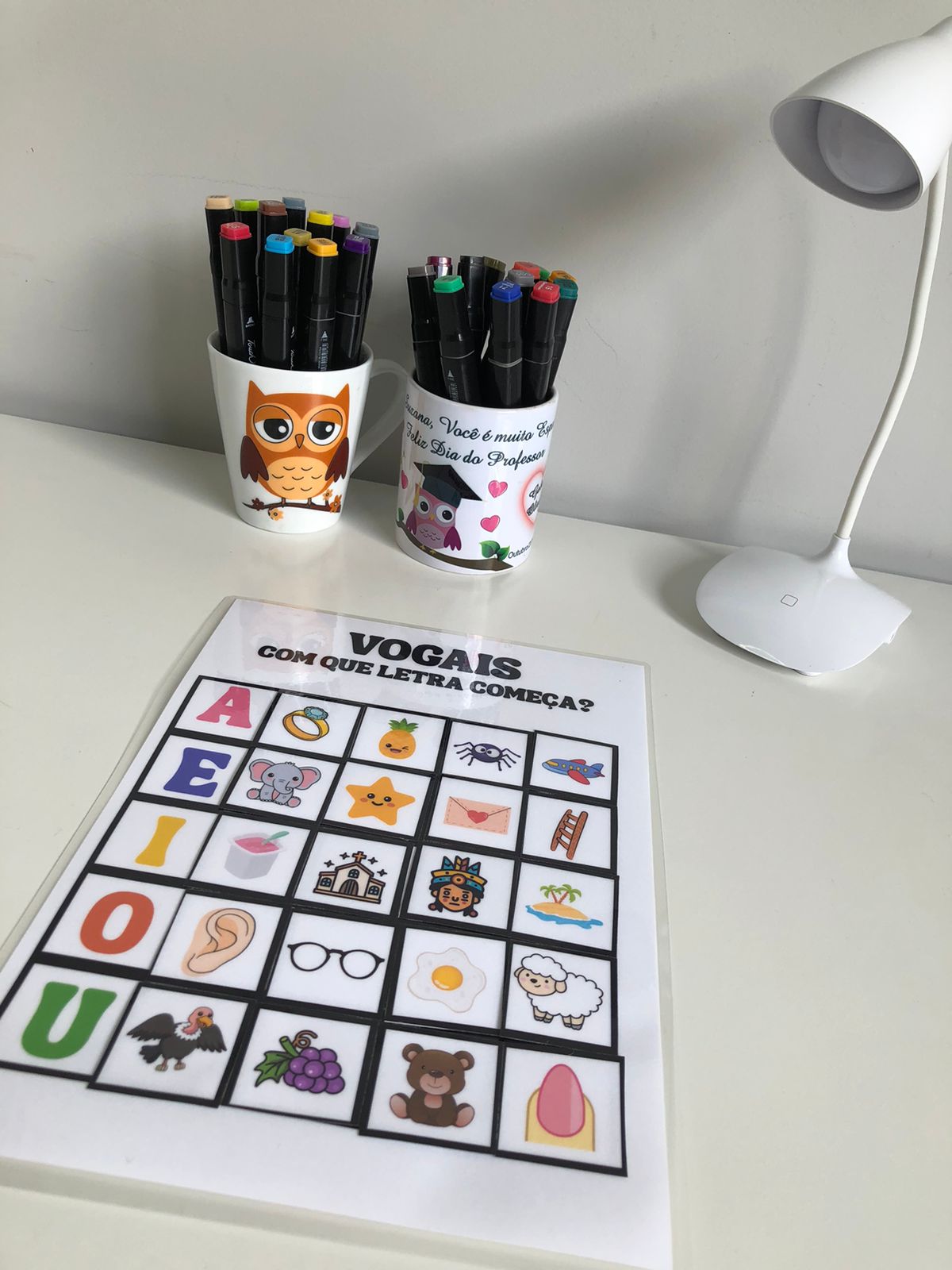 Vogais: Com que letra começa? - Imagem 6